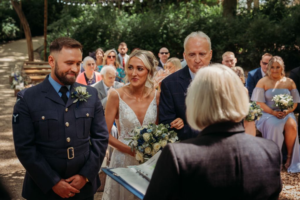 Outdoor wedding ceremony with bride and groom