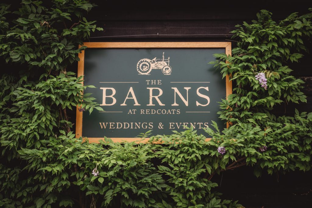 The Barns sign for weddings and events venue.