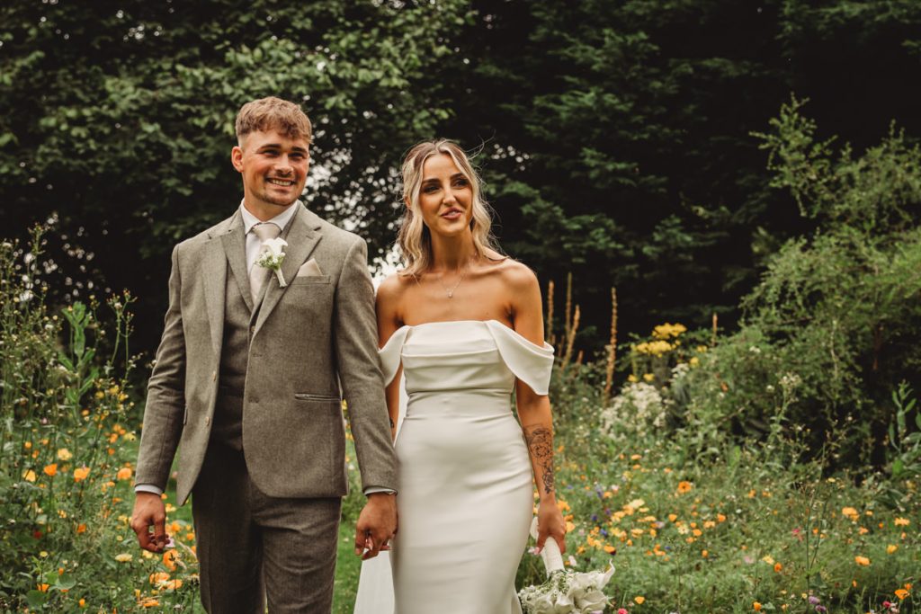 Bride and groom in garden setting