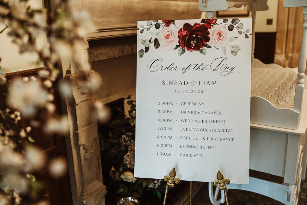 Wedding schedule with floral design.
