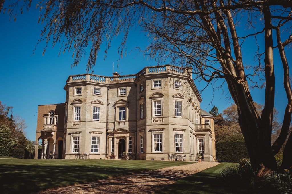 Elegant Georgian mansion in sunny garden setting at Bourton Hall by Tom Stenlake Photography