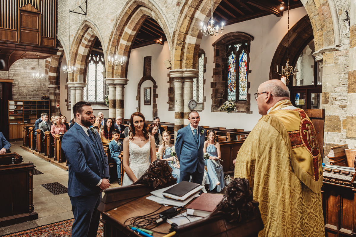 Wedding ceremony in a historical church setting.