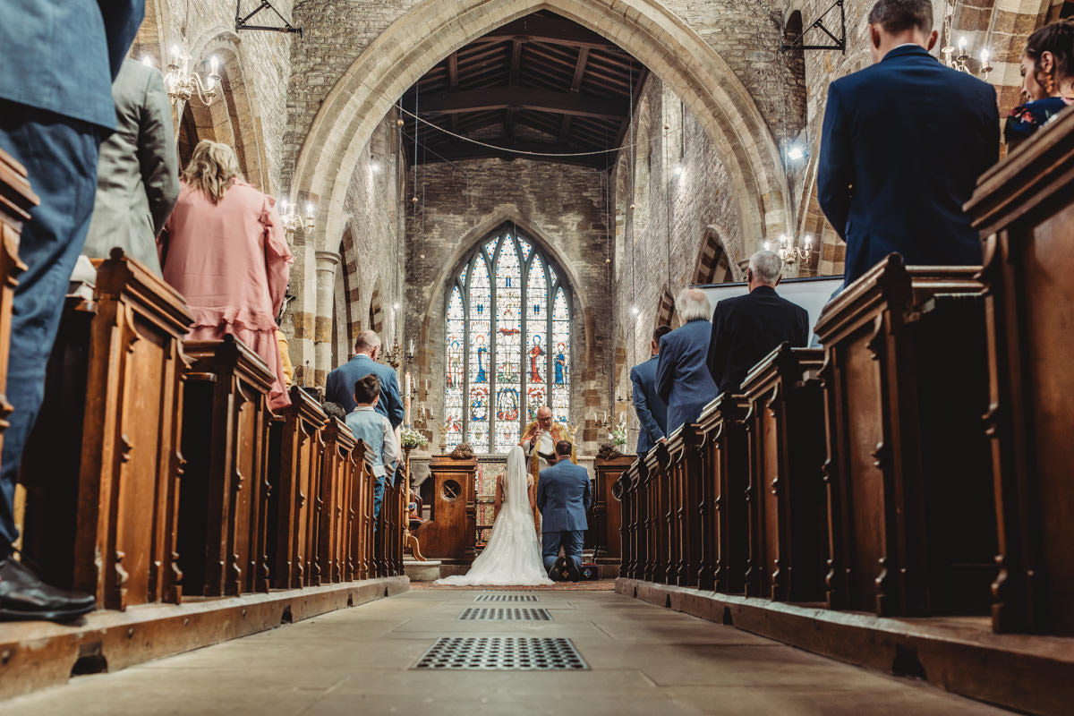 Wedding ceremony inside a historic church.